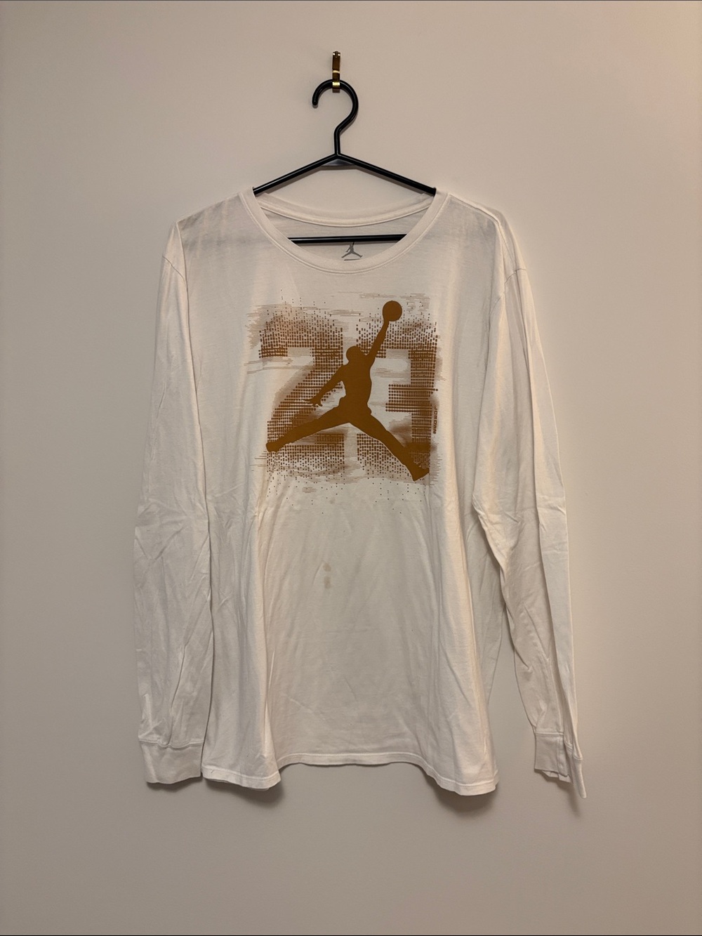 Jordan Men's Long Sleeve Tee in White with Gold Jumpman Graphic